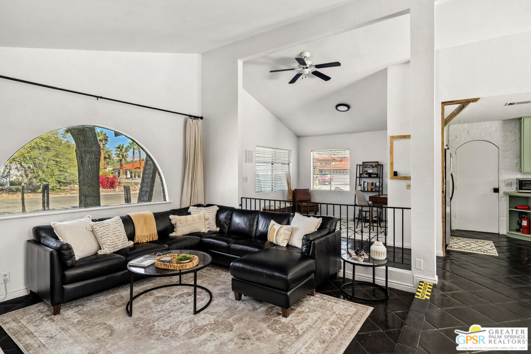 2493 East Powell Road Palm Springs, CA 92262 - Photo 3 of 43 a living room with furniture and wooden floor