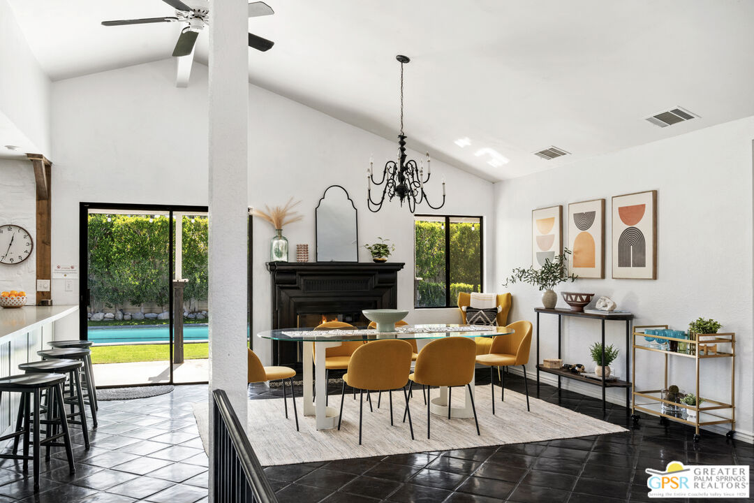 2493 East Powell Road Palm Springs, CA 92262 - Photo 5 of 43 a view of a dining room and livingroom view