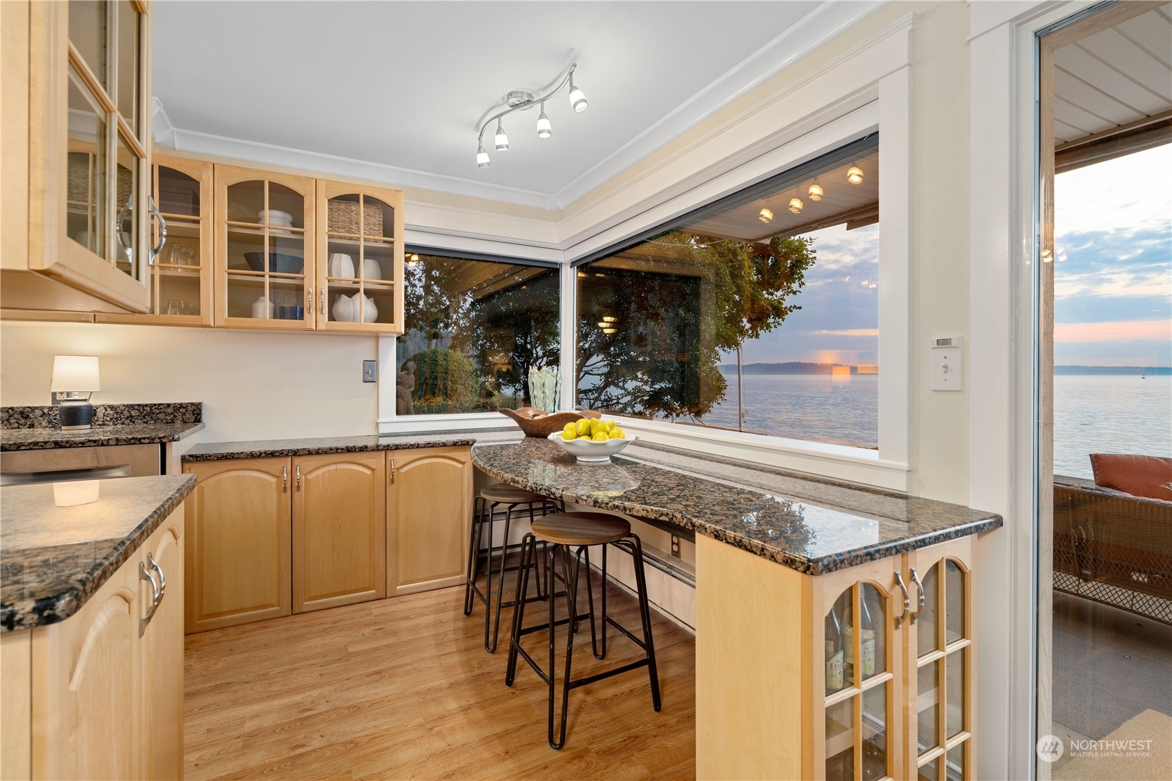 7127 Beach Drive Southwest Seattle, WA 98136 - Photo 15 of 33 a view of a kitchen with dining table and chairs