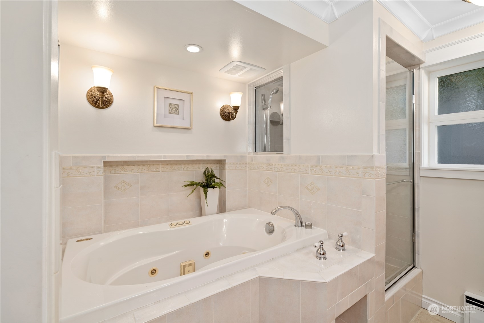 7127 Beach Drive Southwest Seattle, WA 98136 - Photo 25 of 33 a bathroom with a tub a sink and mirror
