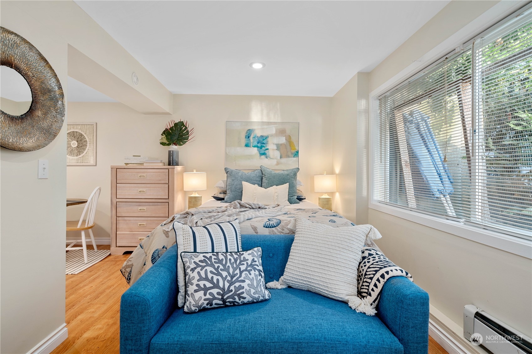 7127 Beach Drive Southwest Seattle, WA 98136 - Photo 27 of 33 a bedroom with furniture and a window