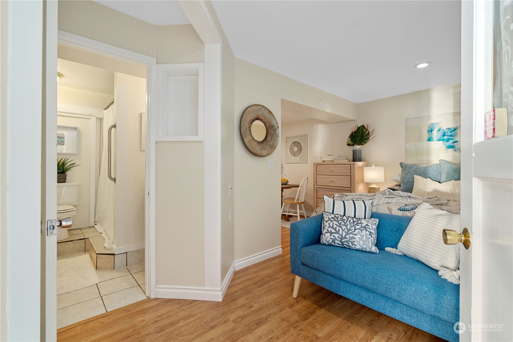 7127 Beach Drive Southwest Seattle, WA 98136 - Photo 28 of 33 a living room with furniture and a wooden floor