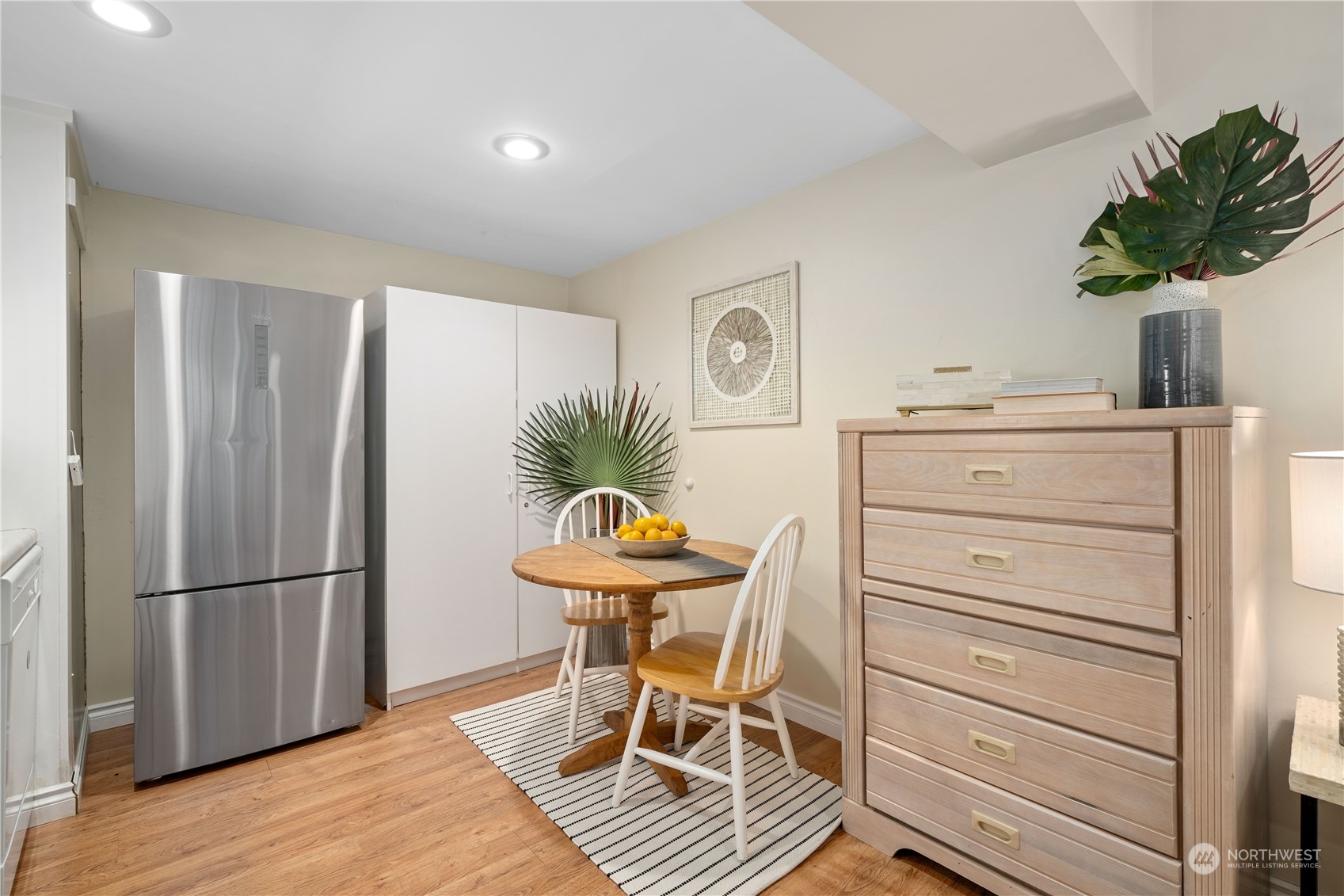 7127 Beach Drive Southwest Seattle, WA 98136 - Photo 31 of 33 a room with furniture and a potted plant