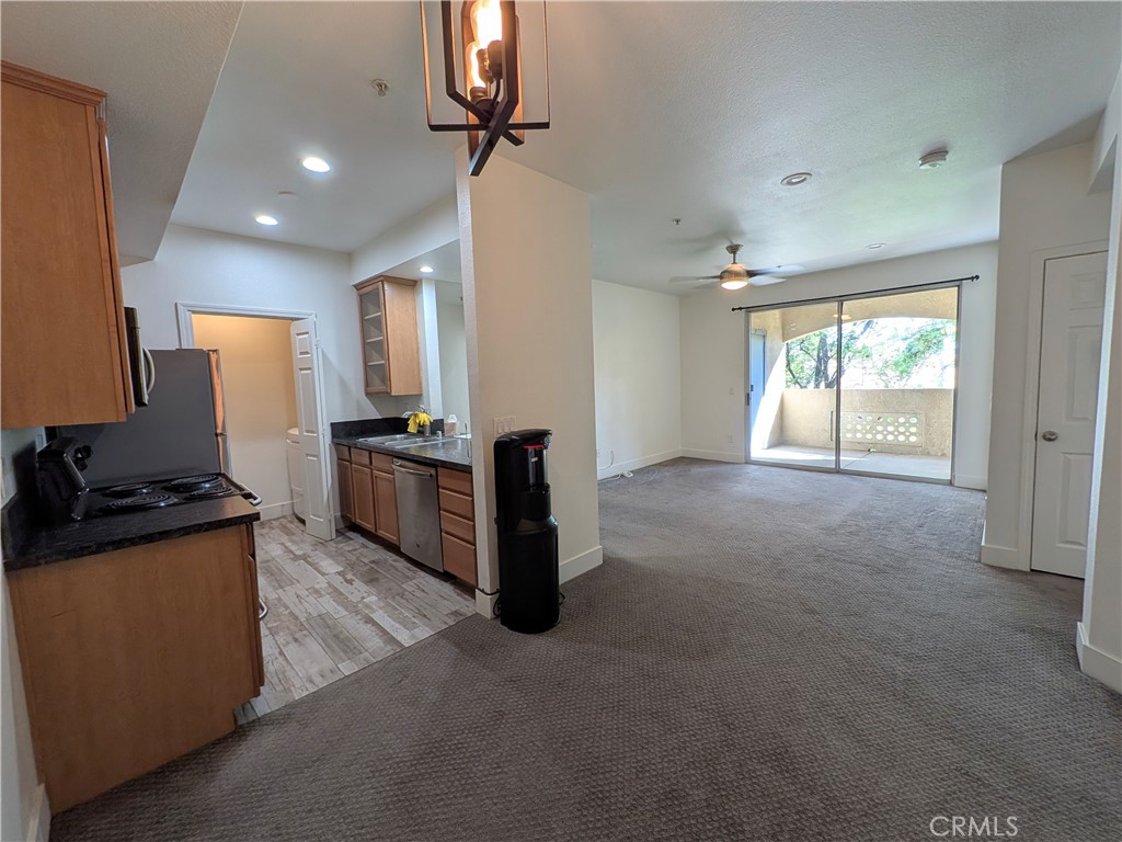 375 Central, Unit 19 Riverside, CA 92507 - Photo 7 of 21 Living room and kitchen