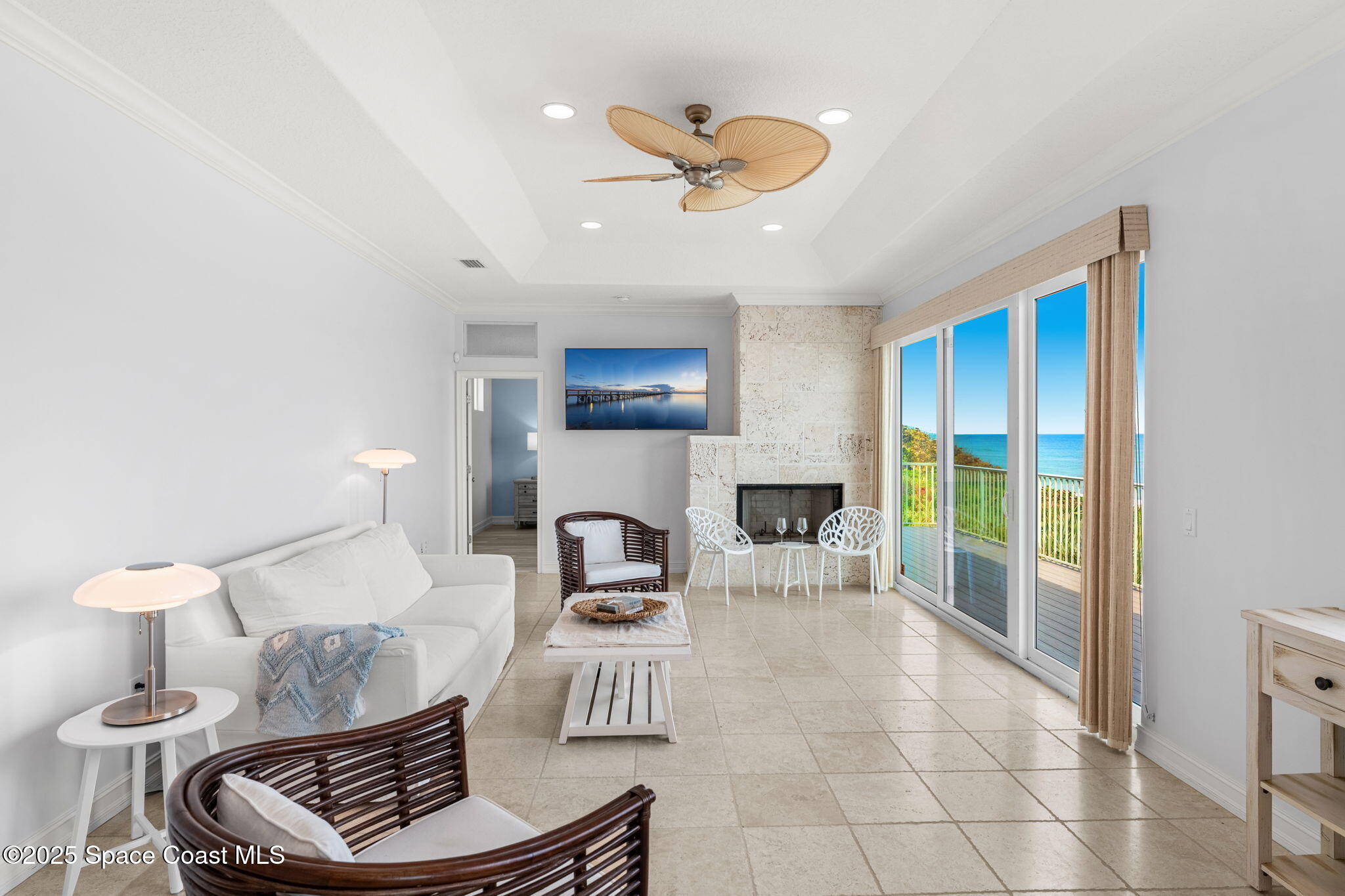 5795 Florida A1A Melbourne Beach, FL 32951 - Photo 23 of 71 a living room with furniture and a window