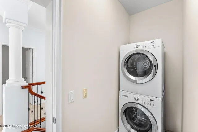 a bathroom with a granite countertop sink a toilet a mirror and shower