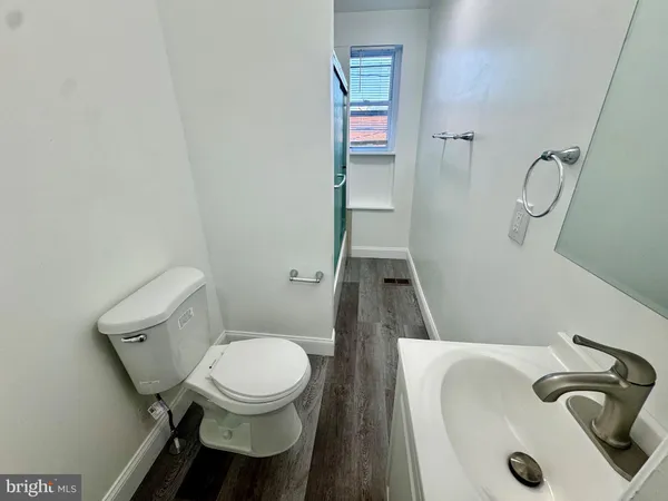 a bathroom with a sink and a toilet
