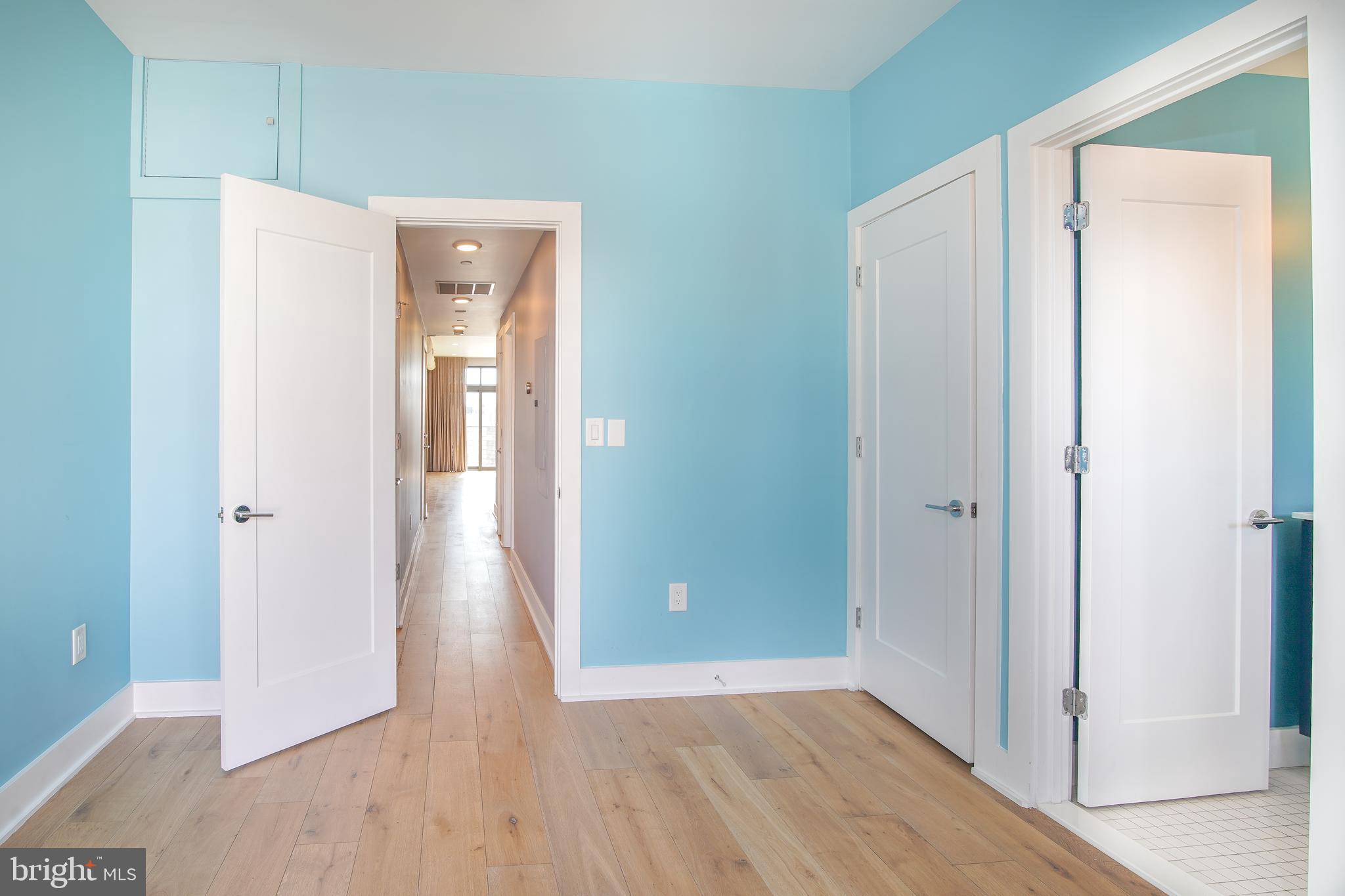 1012 Harvard Street Northwest, Unit 8 Washington, DC 20001 - Photo 21 of 34 a view of a hallway with wooden floor