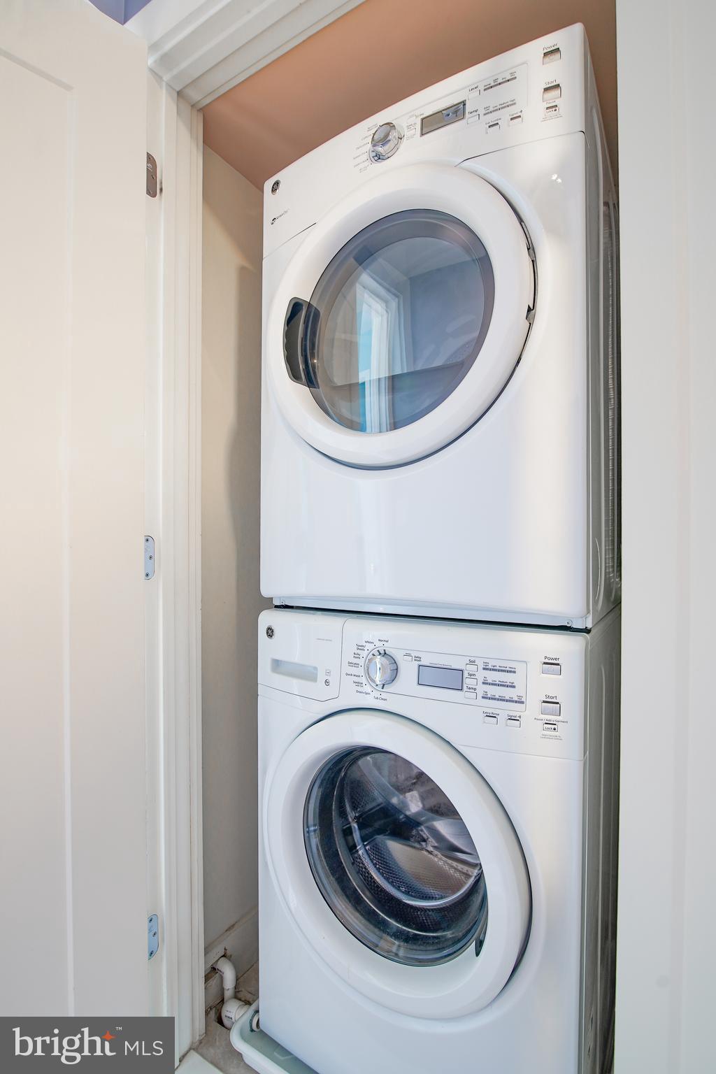 1012 Harvard Street Northwest, Unit 8 Washington, DC 20001 - Photo 31 of 34 a utility room with dryer and washer