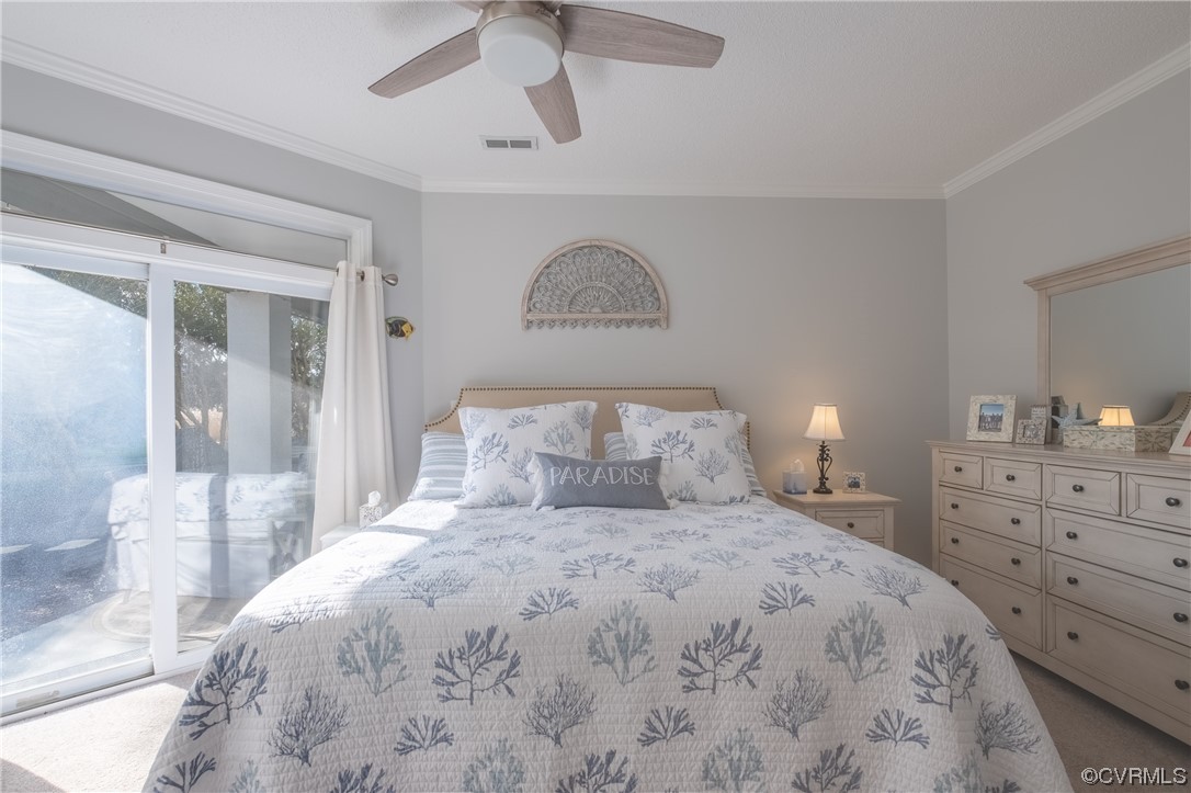 1003 High Dunes Quay, Unit 101 Hampton, VA 23664 - Photo 28 of 42 a bedroom with a bed and a dresser