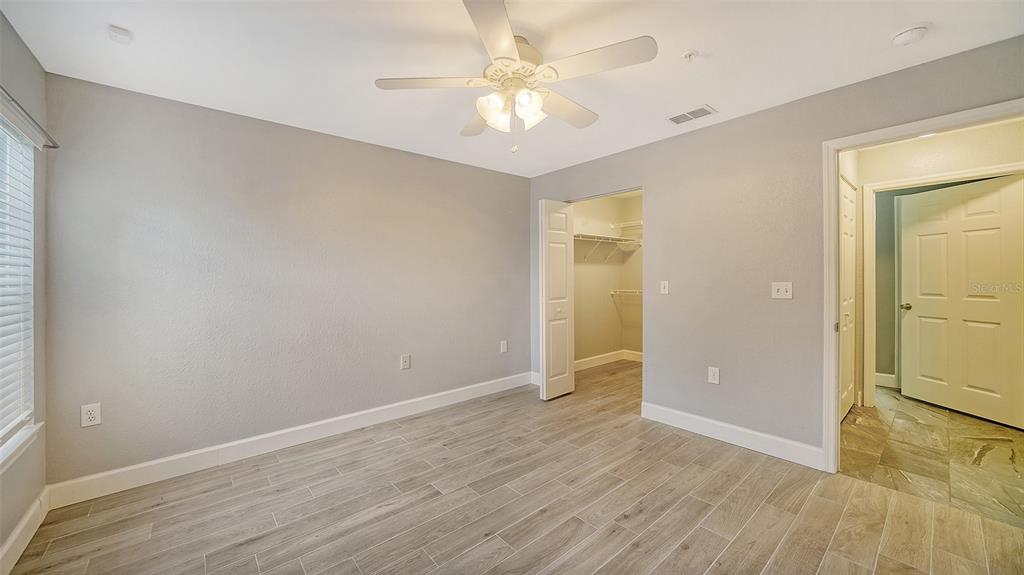 8923 Manor Loop, Unit 106 Lakewood Ranch, FL 34202 - Photo 25 of 36 Bedroom 2 with walk in closet