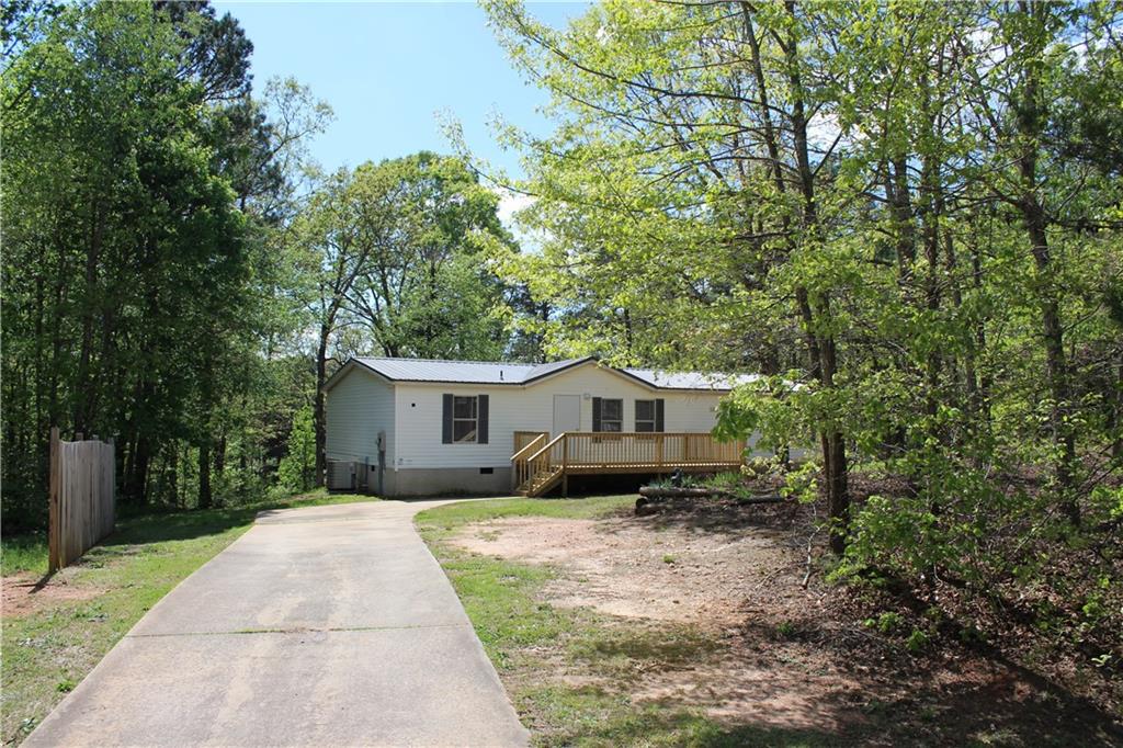 6739 Victoria Lane Lula, GA 30554 - Photo 1 of 1 front view of a house with a yard