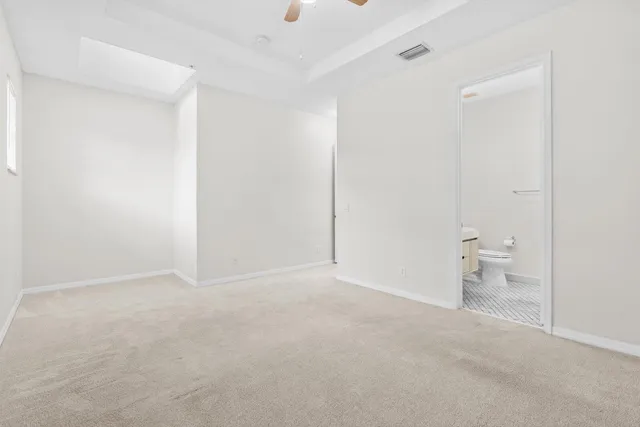 a bathroom with a sink toilet and vanity