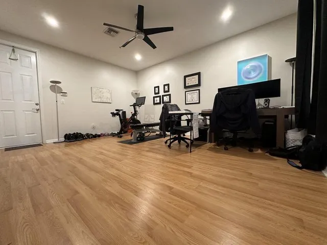 a view of a room with gym equipment