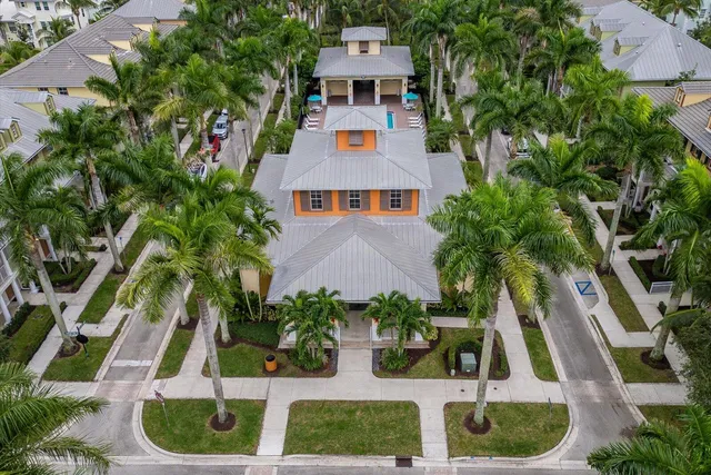 an aerial view of a house with a garden
