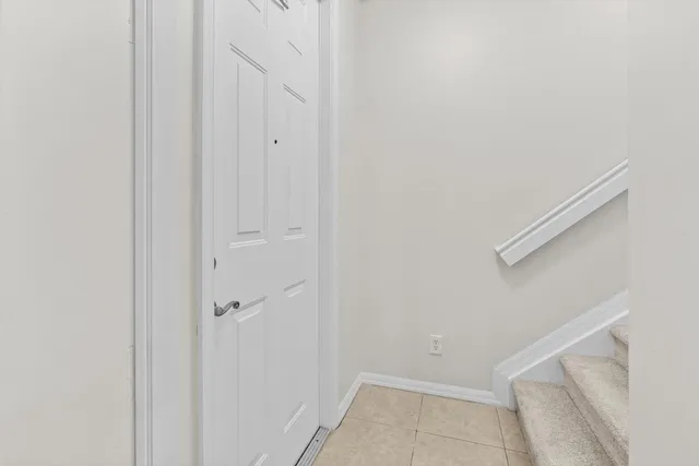 a bathroom with a sink toilet and a mirror