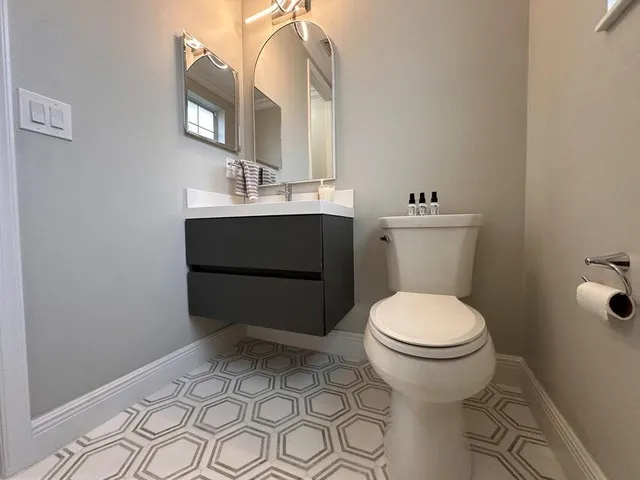 a bathroom with a sink and a toilet