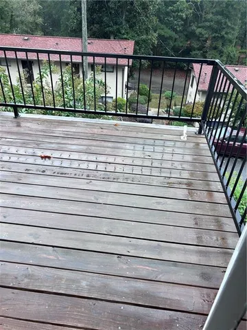 a view of a balcony with a potted plant