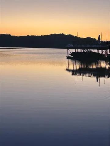 a view of a lake with a mountain in the background