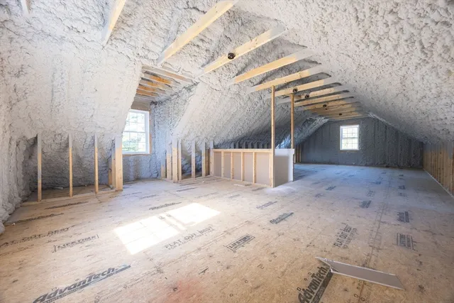 a view of a hallway with stairs