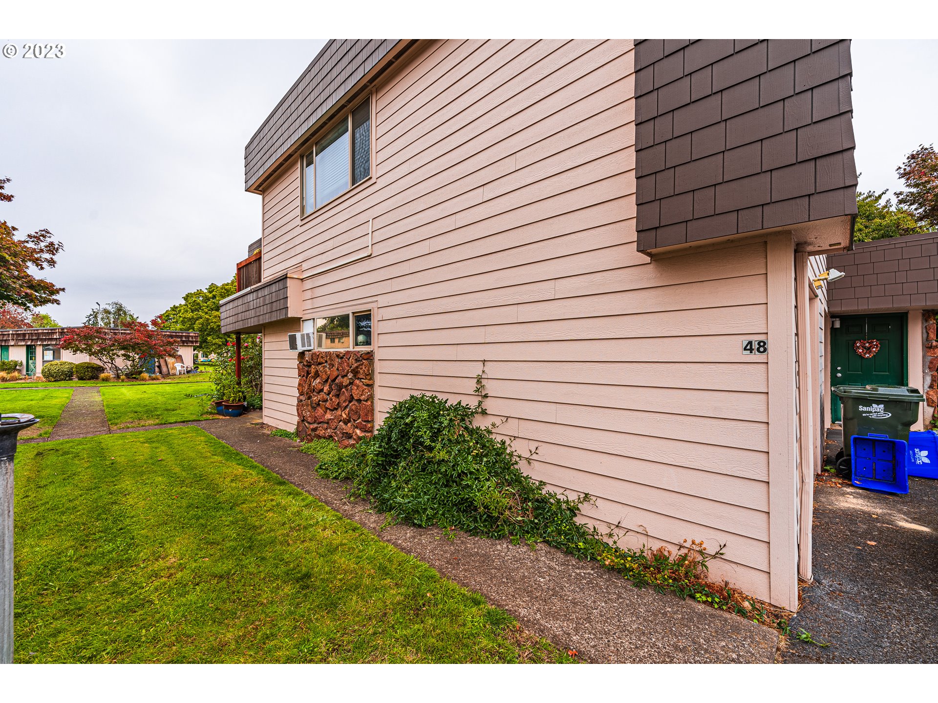 2727 Gateway Street, Unit 48 Springfield, OR 97477 - Photo 2 of 25 a view of a house with a backyard