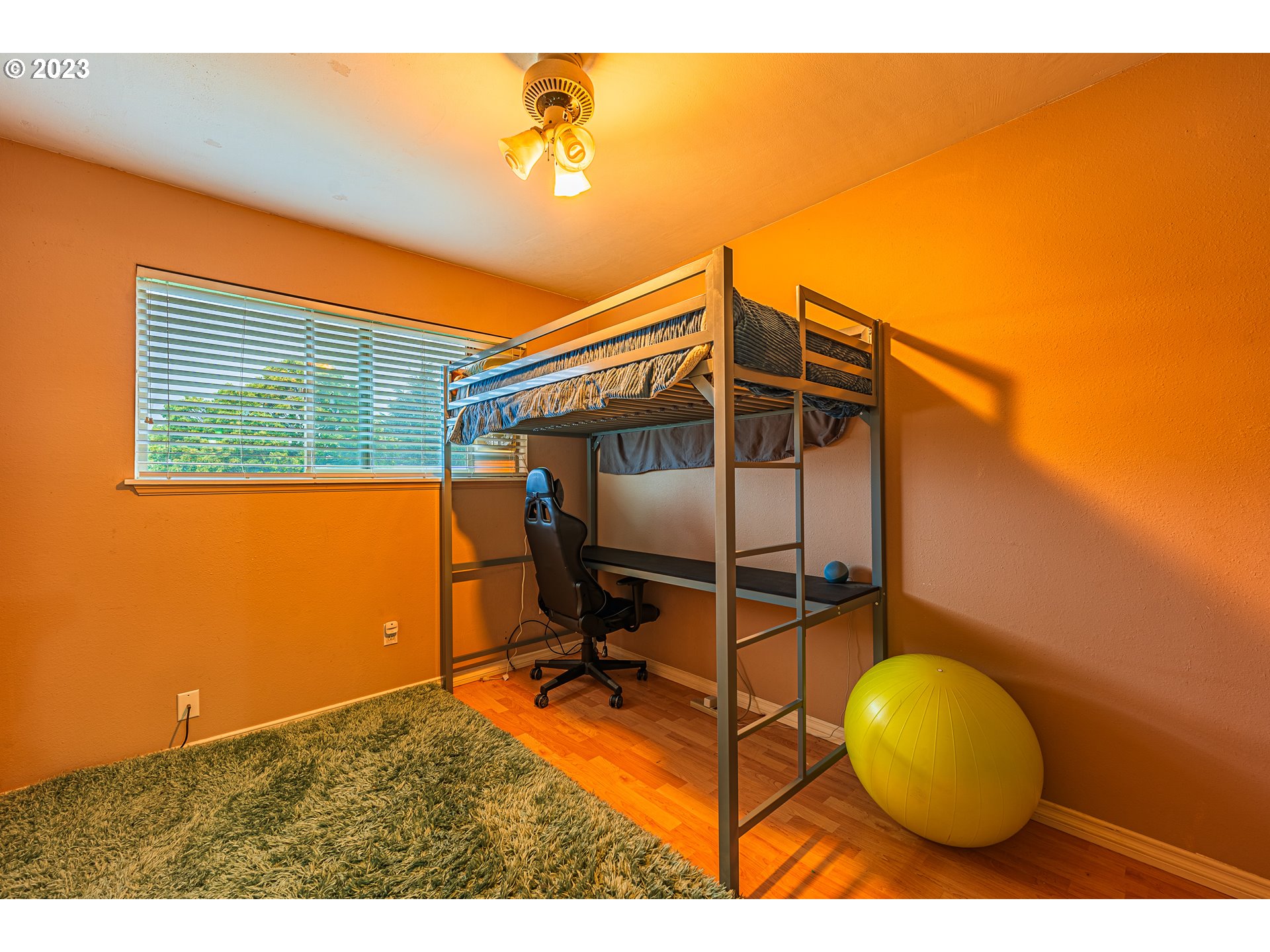 2727 Gateway Street, Unit 48 Springfield, OR 97477 - Photo 21 of 25 a view of a room with wooden floor and a potted plant