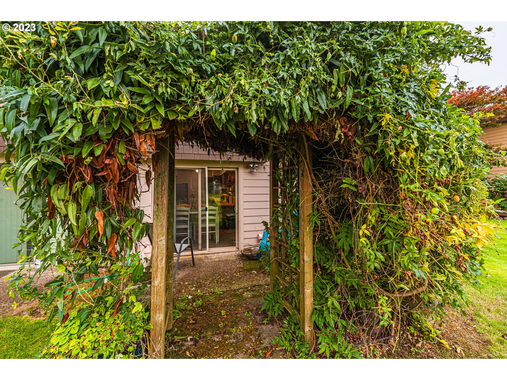 2727 Gateway Street, Unit 48 Springfield, OR 97477 - Photo 23 of 25 a view of a house with a tree