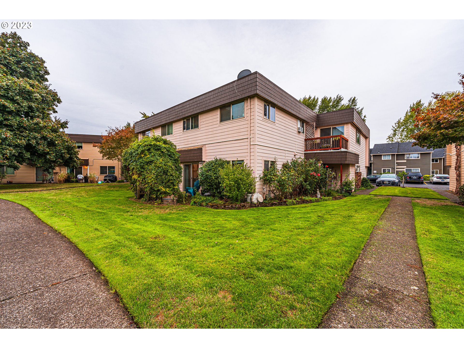 2727 Gateway Street, Unit 48 Springfield, OR 97477 - Photo 24 of 25 a view of a house with a yard
