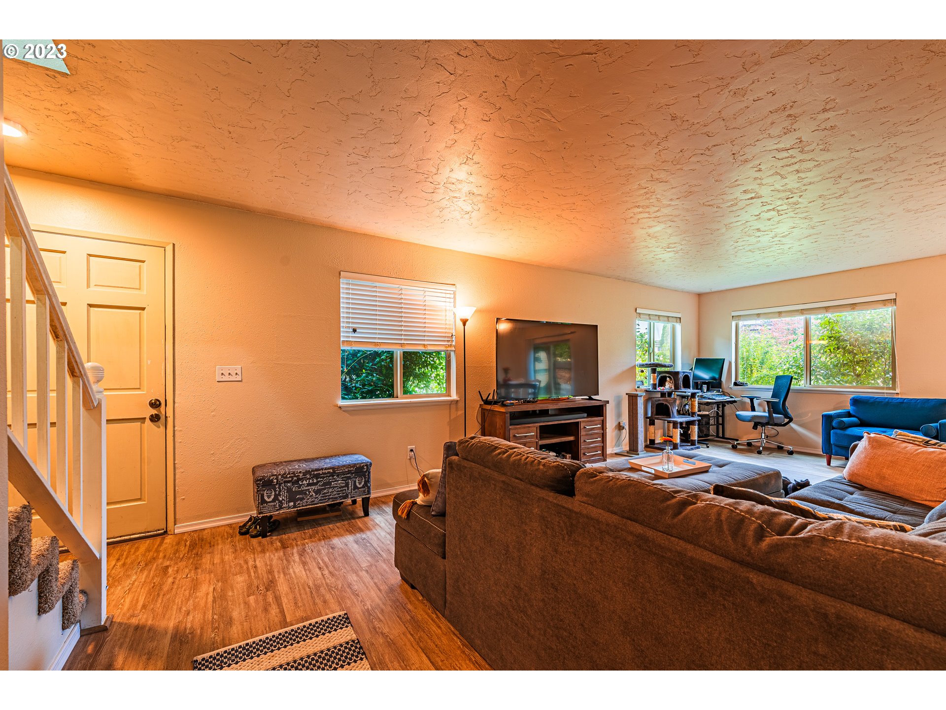 2727 Gateway Street, Unit 48 Springfield, OR 97477 - Photo 4 of 25 a living room with furniture and a flat screen tv