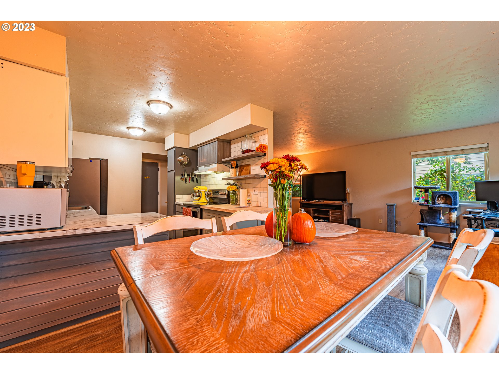 2727 Gateway Street, Unit 48 Springfield, OR 97477 - Photo 9 of 25 a dining room with furniture and wooden floor