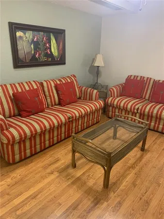 a living room with a couch and a couch
