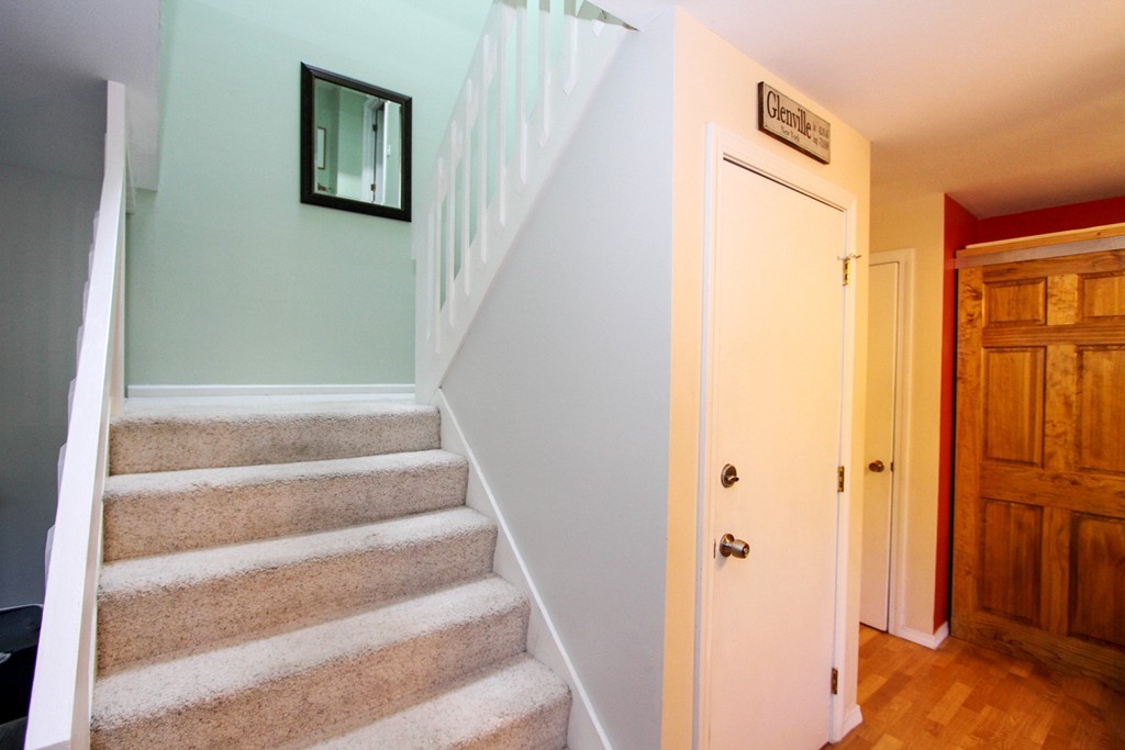 41 Leland Farm Road, Unit 41 Ashland, MA 01721 - Photo 6 of 9 a view of a hallway with wooden floor and entryway