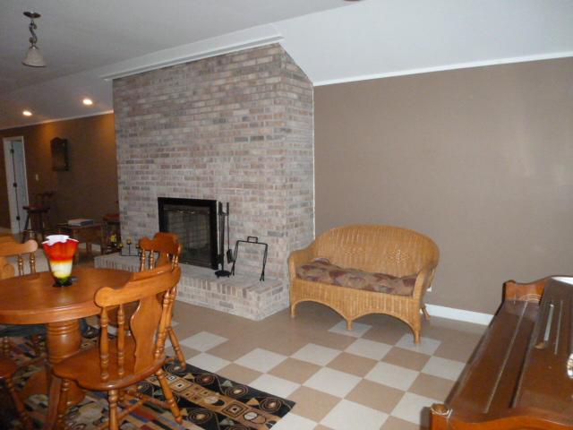 3900 McGregor Road Adams, TN 37010 - Photo 15 of 20 a living room with furniture and a fireplace
