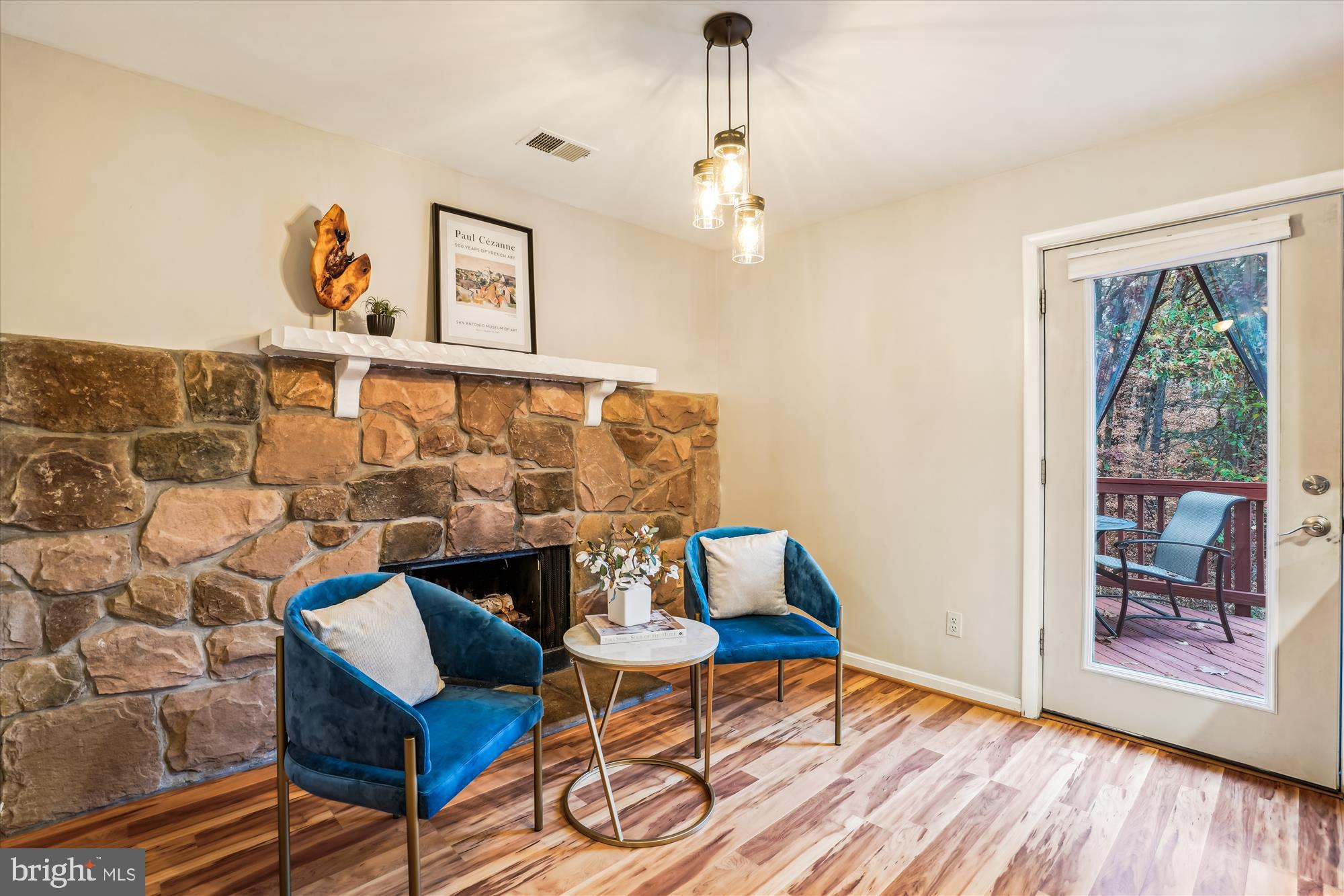 8711 Ridge Hollow Court Springfield, VA 22152 - Photo 14 of 42 Breakfast Area highlighted by fireplace.