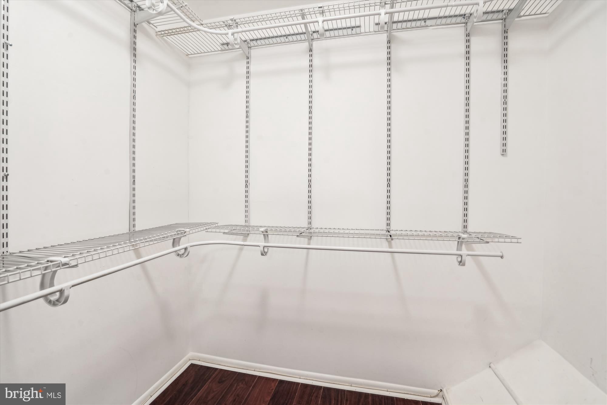 8711 Ridge Hollow Court Springfield, VA 22152 - Photo 22 of 42 Walk In Closet in Primary Bedroom.
