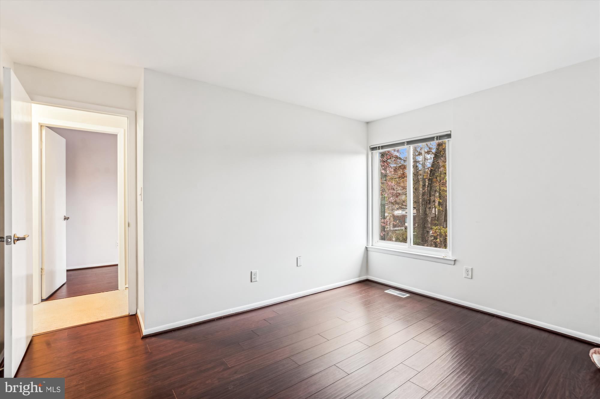 8711 Ridge Hollow Court Springfield, VA 22152 - Photo 24 of 42 Bedroom 2 with view of trees out back.