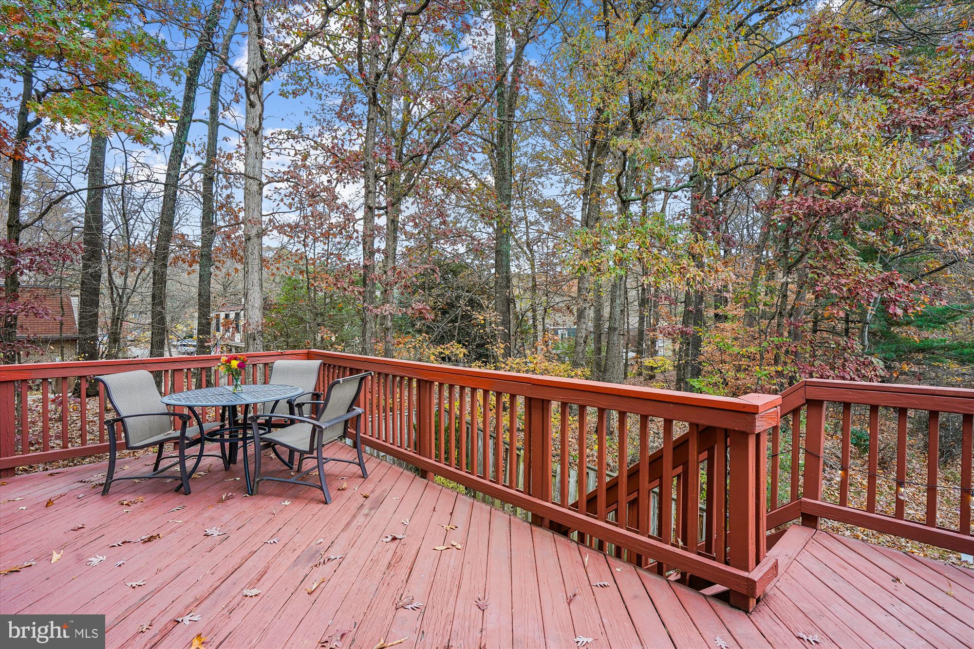 8711 Ridge Hollow Court Springfield, VA 22152 - Photo 34 of 42 Deck with stairs descending to patio.