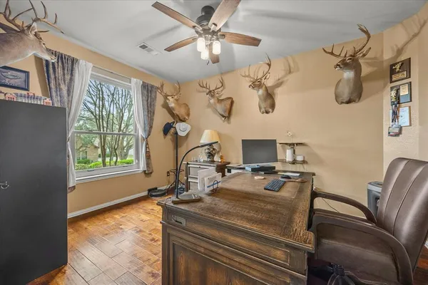 a room with a bed furniture and a window