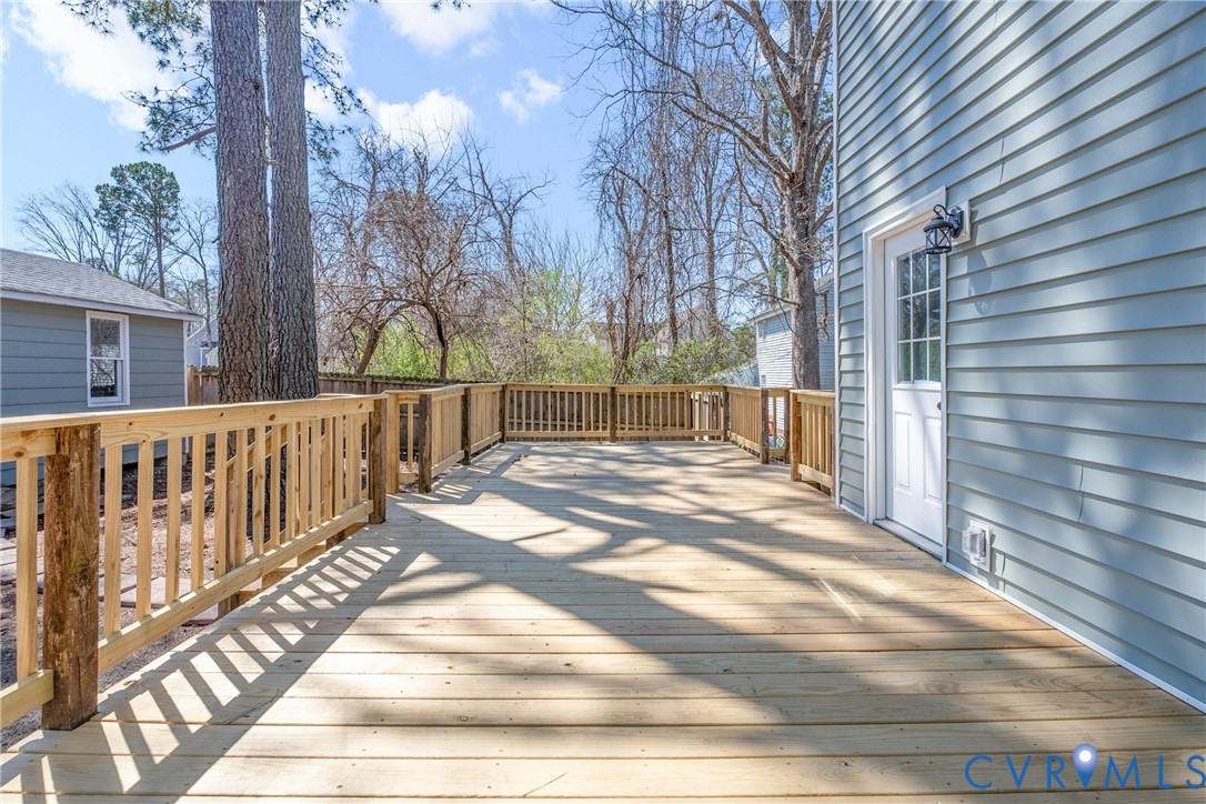 11101 Timonium Drive Chester, VA 23831 - Photo 17 of 21 a view of backyard with wooden fence and large trees
