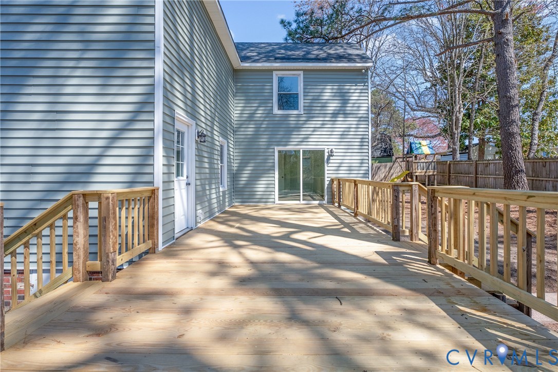 11101 Timonium Drive Chester, VA 23831 - Photo 18 of 21 a view of a house with wooden fence