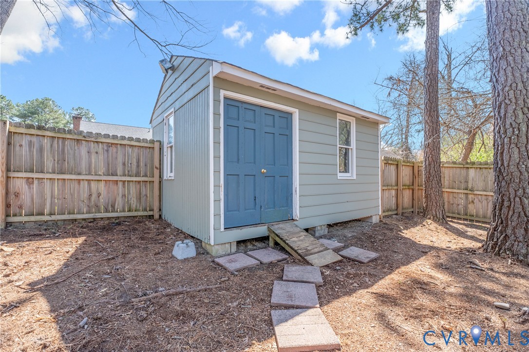 11101 Timonium Drive Chester, VA 23831 - Photo 21 of 21 a view of a backyard of the house