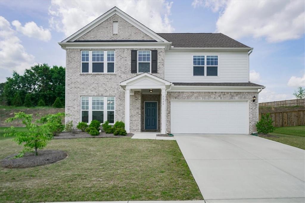 2420 Ames Street Bethlehem, GA 30620 - Photo 1 of 1 a front view of a house with yard and green space