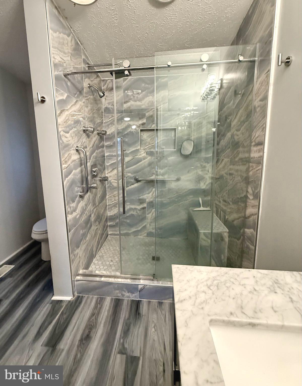92 Arrowhead Road Shamong, NJ 08088 - Photo 20 of 25 a bathroom with a shower and toilet