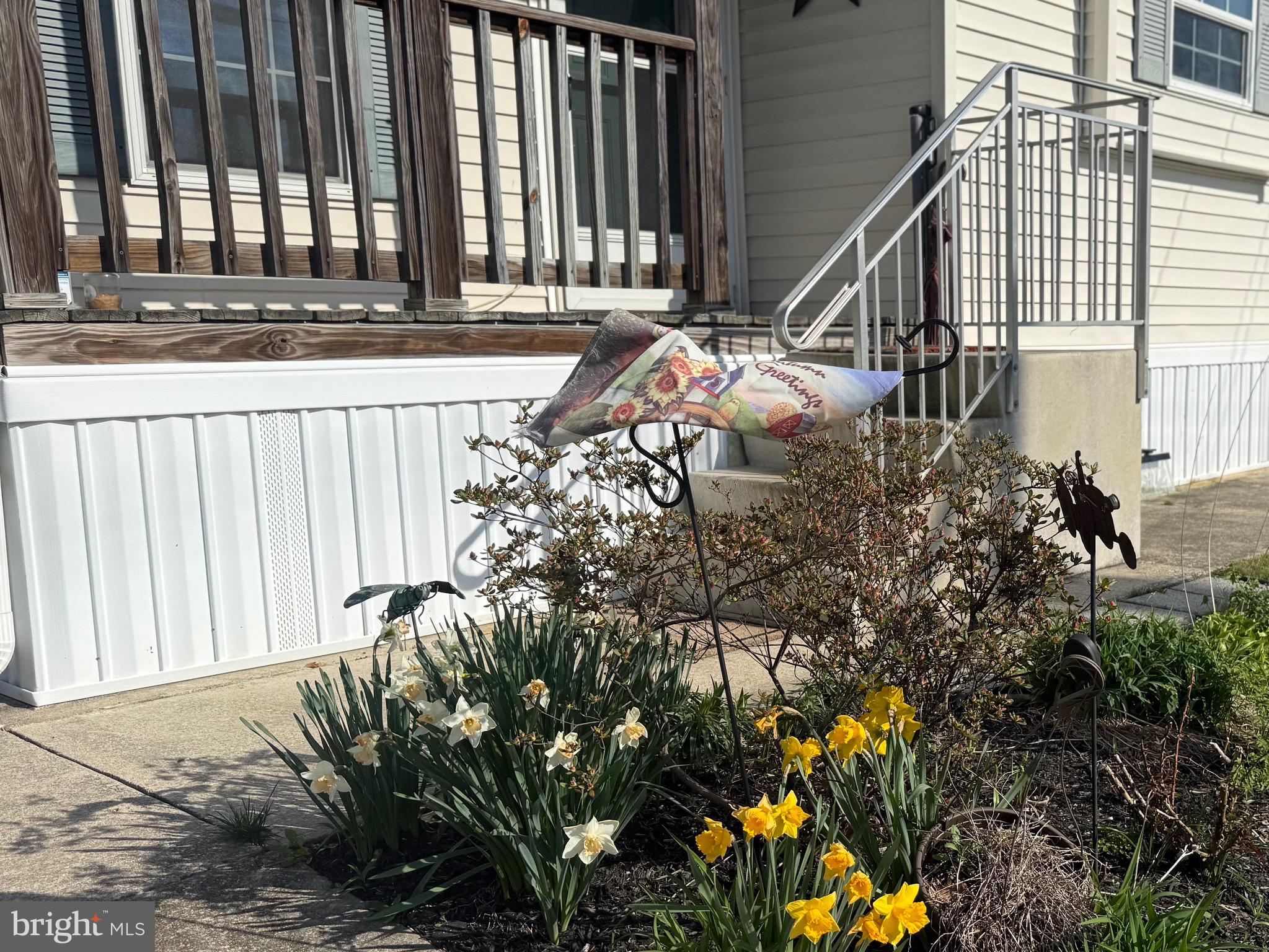 92 Arrowhead Road Shamong, NJ 08088 - Photo 5 of 25 a view of a house with a small yard and potted plants