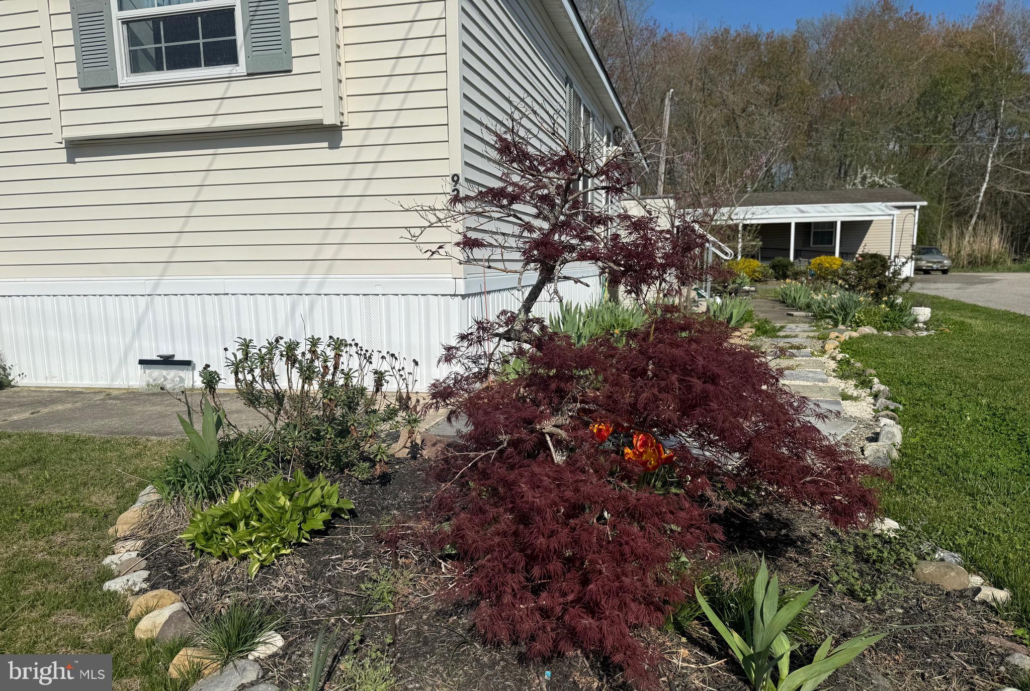 92 Arrowhead Road Shamong, NJ 08088 - Photo 6 of 25 a view of a house with a yard and sitting area