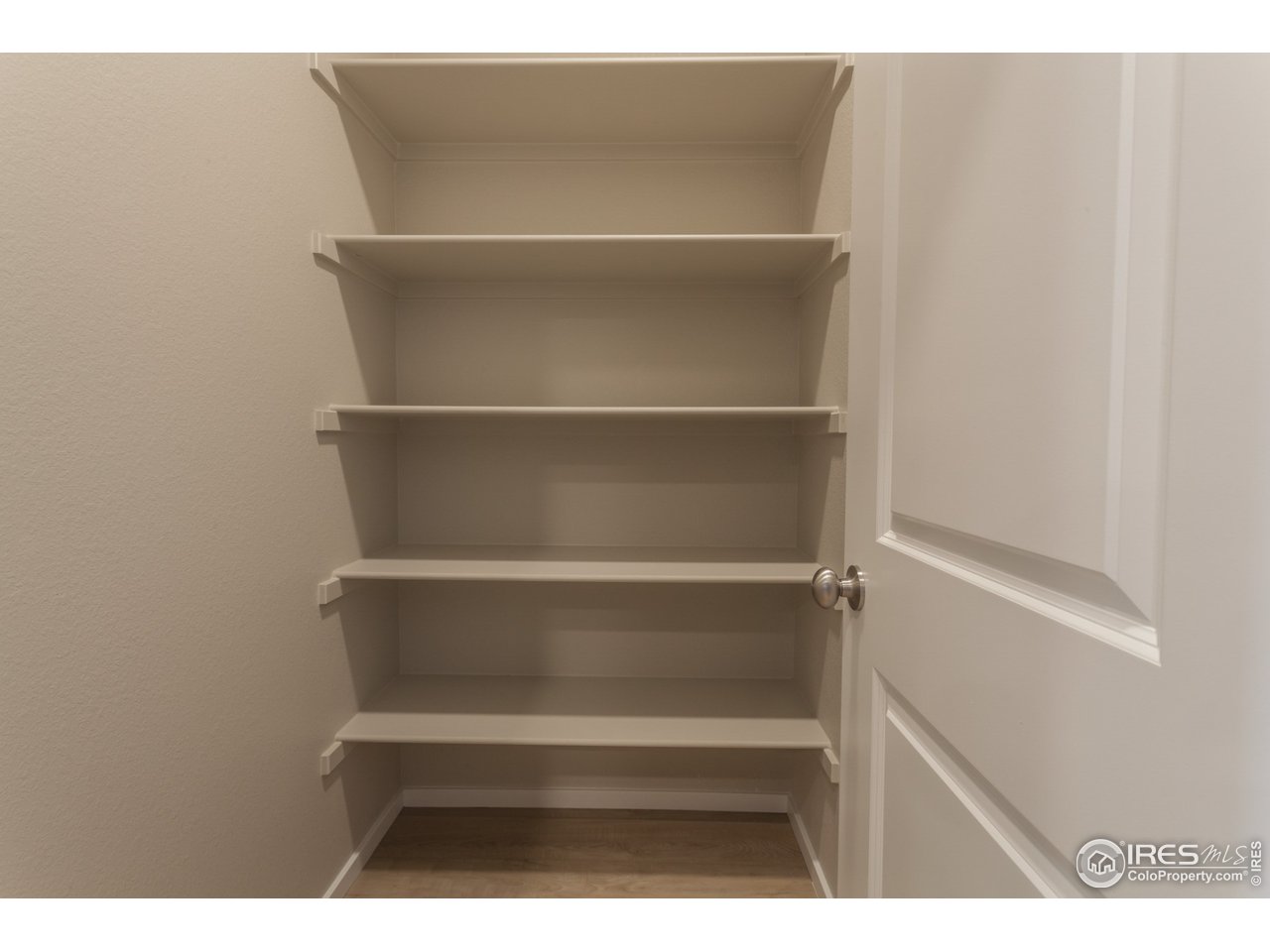 6613 4th St Road, Unit 4 Greeley, CO 80634 - Photo 16 of 34 EXAMPLE PHOTO: PANTRY OFF OF KITCHEN