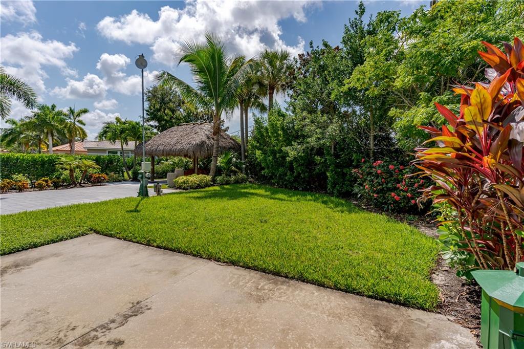 13499 Snook Circle Naples, FL 34114 - Photo 20 of 39 a view of a park with plants and trees