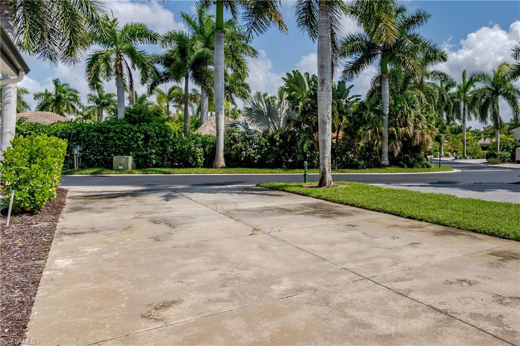 13499 Snook Circle Naples, FL 34114 - Photo 28 of 39 a view of a park with palm trees