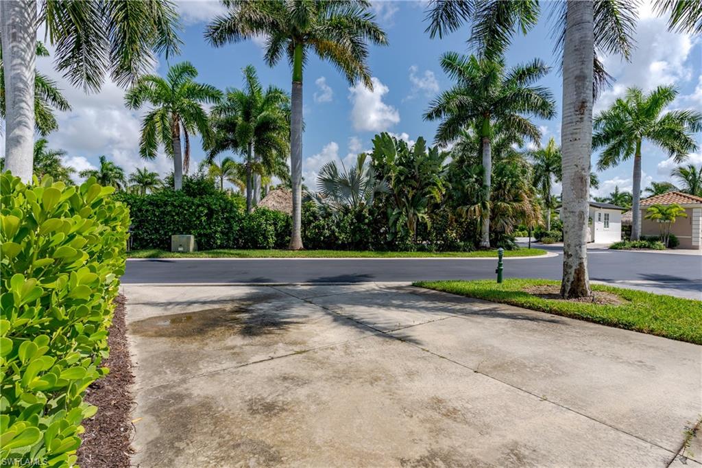 13499 Snook Circle Naples, FL 34114 - Photo 32 of 39 a view of street with a yard