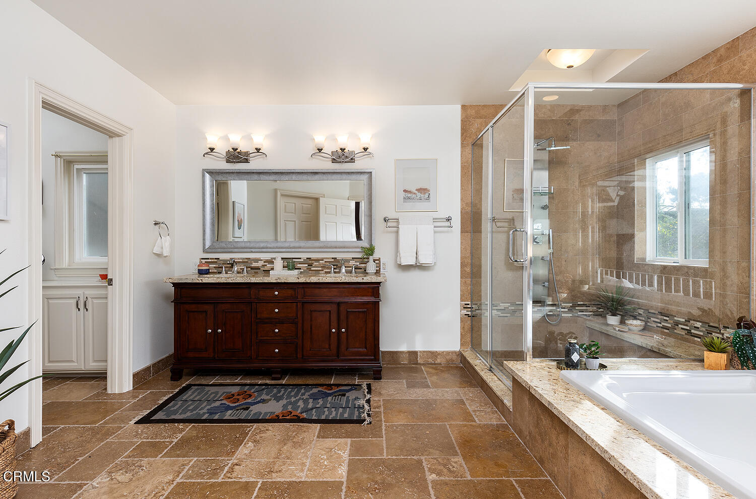 1386 Glen Oaks Boulevard Pasadena, CA 91105 - Photo 32 of 47 a bathroom with a granite countertop sink a mirror and a shower